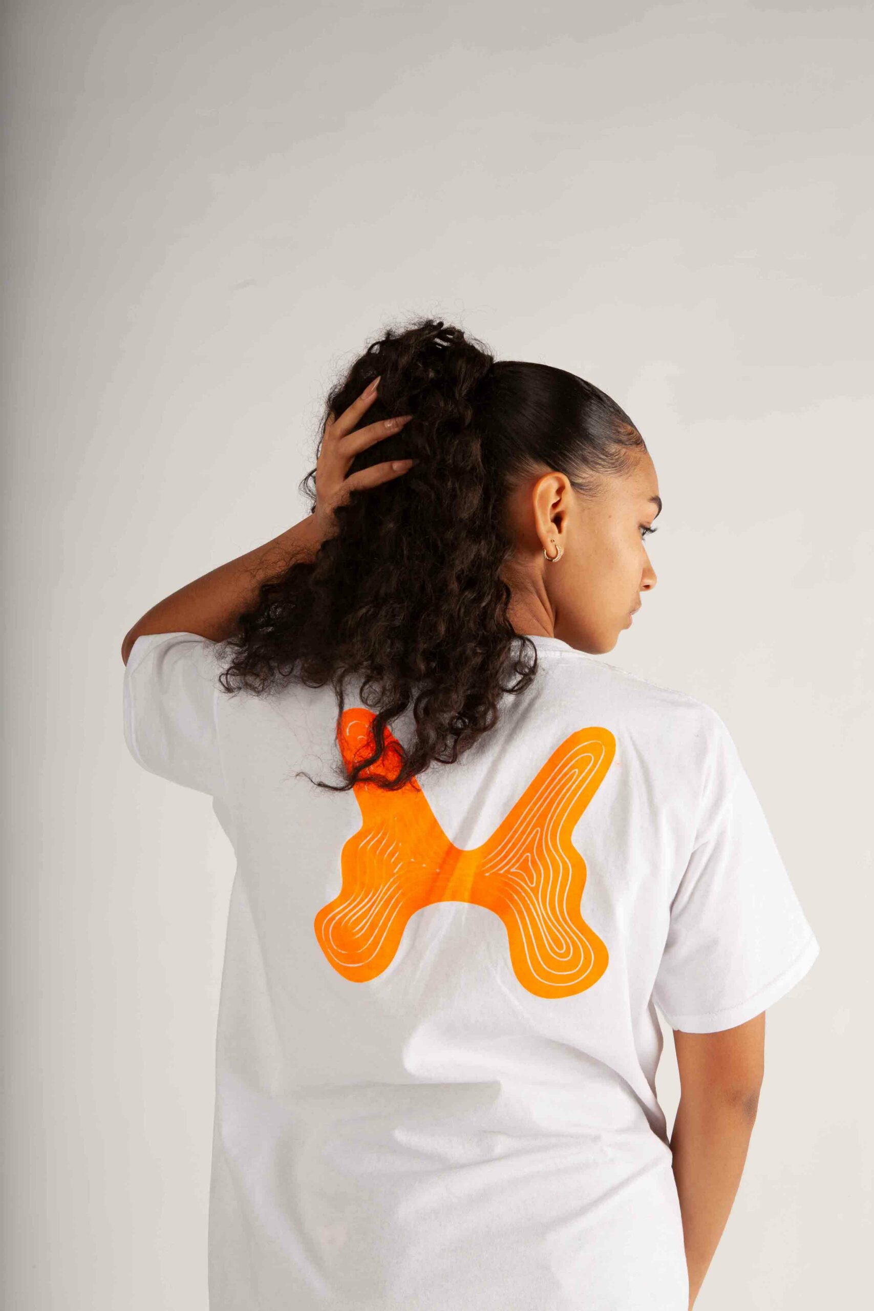 TEE orange logo | Coexist42
